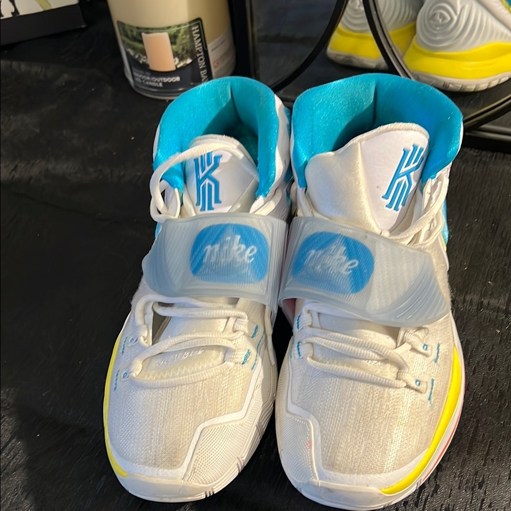 Nike White and Blue Athletic Shoes with High-Top Design and Striking Collar
